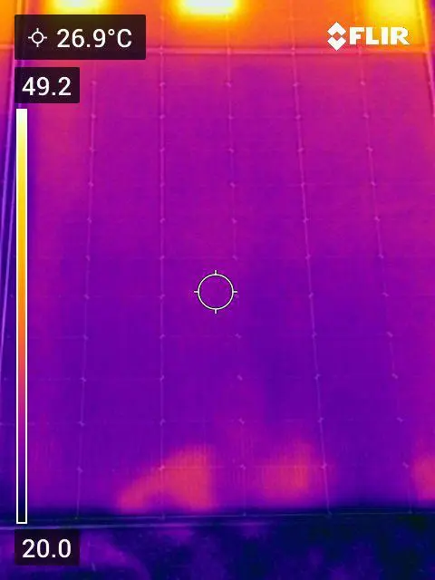 Thermal image of a cleaned module reading 26.9 °C at the crosshair
